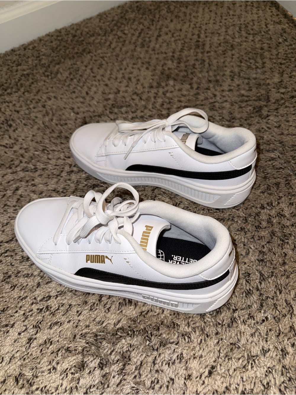 Puma Kids White Sneakers with Black Stripe and Gold Logo